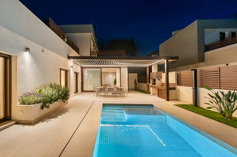 Pool and house in the evening