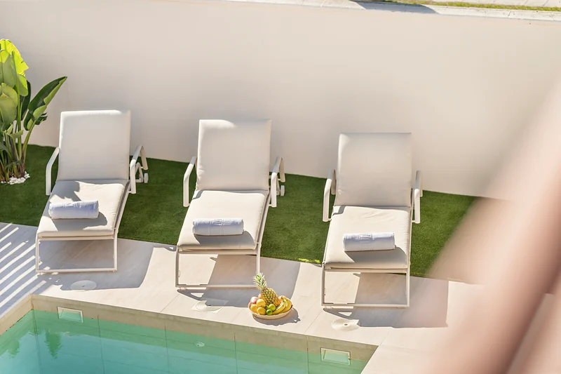 Sun loungers by the pool