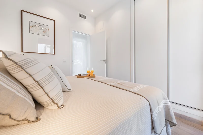 Bedroom with a picture above the bed